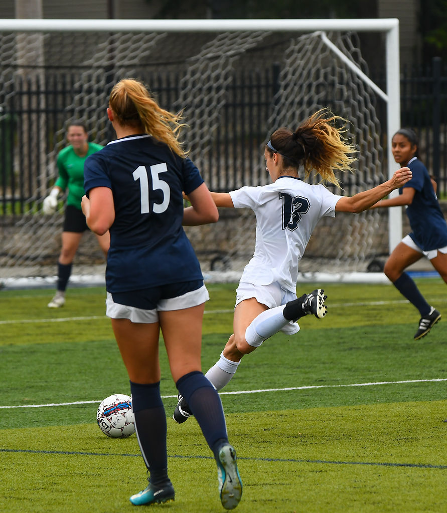 Columbia College defender Brianna Heath shoots to score